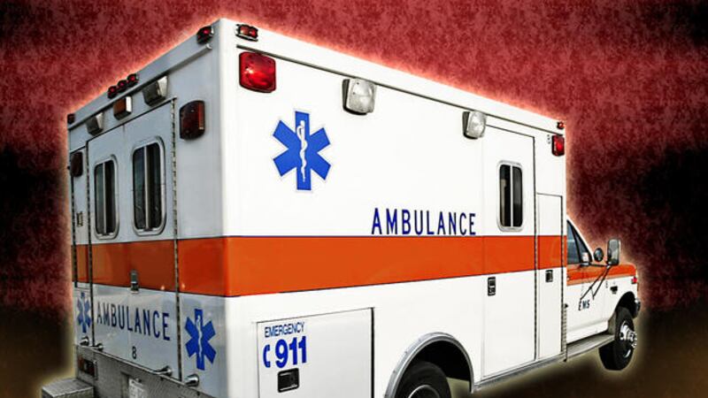 An ambulance enters the Campbell County High School responding to a multiple shooting,...