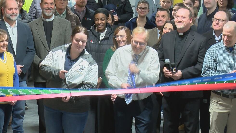 Ffa Ribbion Saxony Lutheran cuts ribbon on new ag classroom facility