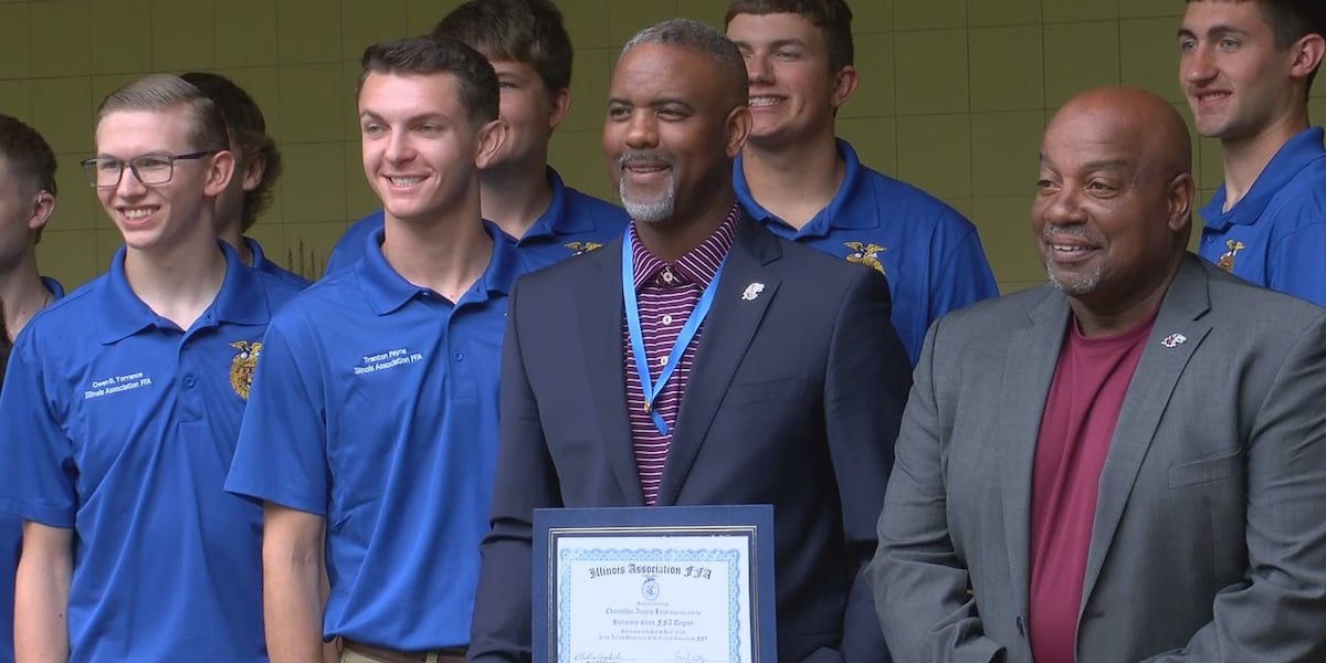Devin Kidd SIU Chancellor Austin Lane receives Illinois State FFA recognition