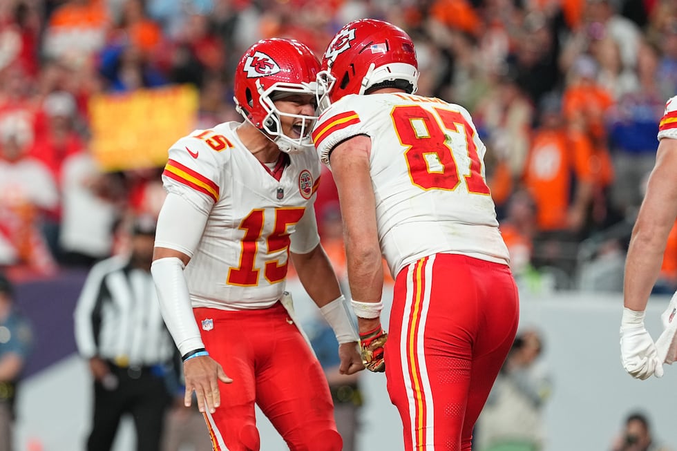Kansas City Chiefs quarterback Patrick Mahomes (15) celebrate a touchdown with Kansas City...