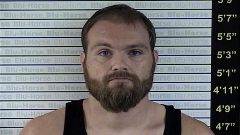 Dustin Reynolds (pictured) is a convicted felon and cannot have firearms, officials said...