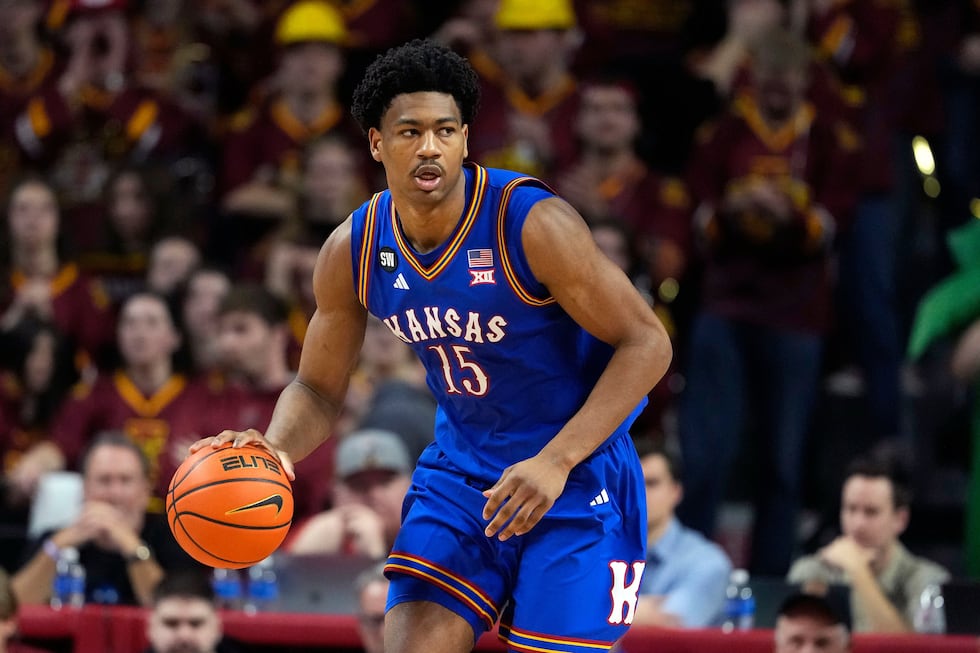 Kansas forward Bryson Tiller (15) drives the ball up the court during the first half of an...